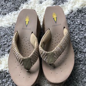 Volatile Wedge Flip Flops